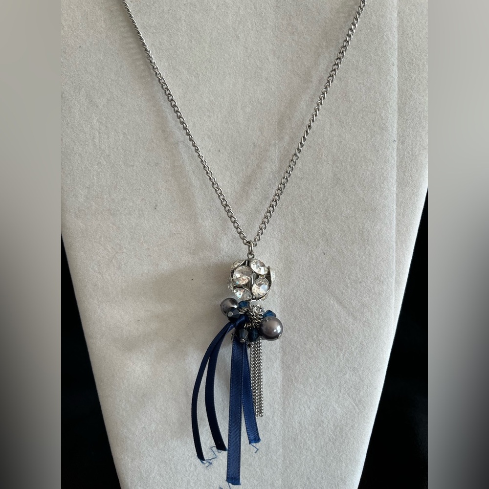 31 inch Silver color chain with crystal/blue ribbon/chain charm.